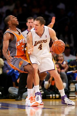 LOS ANGELES - APRIL 29:  Luke Walton #4 of the Los Angeles Lakers goes up against James Jones #22 of the Phoenix Suns in Game Four of the Western Conference Quarterfinals during the 2007 NBA Playoff at Staples Center on April 29, 2007 in Los Angeles, Cali