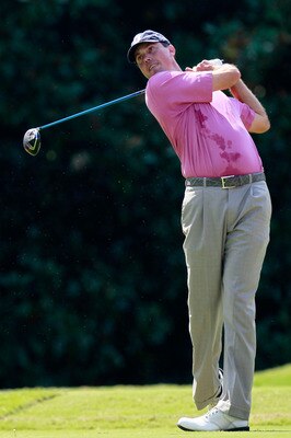 ATLANTA - SEPTEMBER 23:  Matt Kuchar hits a tee shot on the fifth hole during the first round of THE TOUR Championship presented by Coca-Cola at East Lake Golf Club on September 23, 2010 in Atlanta, Georgia.  (Photo by Kevin C. Cox/Getty Images)