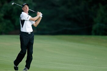 ATLANTA - SEPTEMBER 23:  Jim Furyk hits his approach shot on the 14th hole during the first round of THE TOUR Championship presented by Coca-Cola at East Lake Golf Club on September 23, 2010 in Atlanta, Georgia.  (Photo by Scott Halleran/Getty Images)