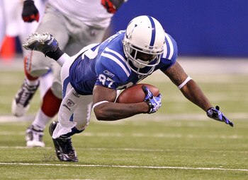 INDIANAPOLIS - SEPTEMBER 19:  Reggie Wayne #87 of the Indianapolis Colts dives for extra yards during the NFL game against the New York Giants  at Lucas Oil Stadium on September 19, 2010 in Indianapolis, Indiana.  (Photo by Andy Lyons/Getty Images)