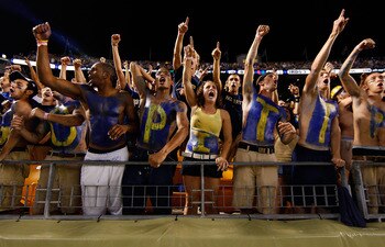 PITTSBURGH - SEPTEMBER 23:  University of Pittsburgh fans cheer during the game against the Miami Hurricanes on September 23, 2010 at Heinz Field in Pittsburgh, Pennsylvania.  (Photo by Jared Wickerham/Getty Images)