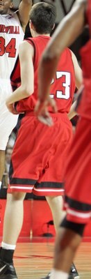 LOUISVILLE, KY - DECEMBER 27: Jerry Smith #34  of the Louisville Cardinals makes a jumpshot against Matt Janning #23 of the Northeastern Huskies on December 27, 2006 at Freedom Hall in Louisville, Kentucky. (Photo by Andy Lyons/Getty Images)