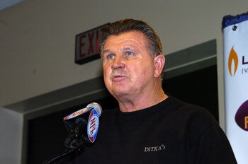 NFL Pro Football Hall of Famer Mike Ditka helps present Jerome Bettis with the Levitra Play of the year Award at the Jacksonville Convention Center on February 2, 2005  (Photo by Al Messerschmidt/Getty Images)