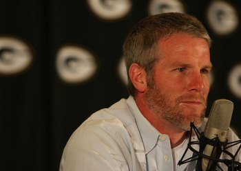 GREEN BAY, WI - MARCH 06: Quarterback Brett Favre of the Green Bay Packers listens to a question at his retirement press conference on March 6, 2008 at Lambeau Field in Green Bay, Wisconsin. (Photo by Jonathan Daniel/Getty Images)