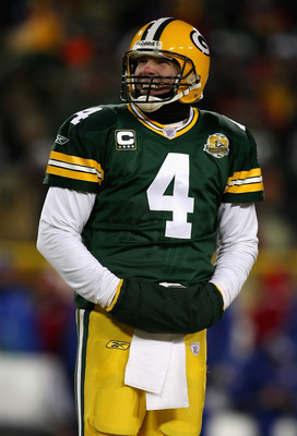 GREEN BAY, WI - JANUARY 20:  Quarterback Brett Favre #4 of the Green Bay Packers looks up to the scoreboard during the NFC championship game against the New York Giants on January 20, 2008 at Lambeau Field in Green Bay, Wisconsin.  (Photo by Jonathan Dani