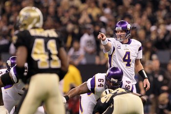 NEW ORLEANS - JANUARY 24:  Brett Favre #4 of the Minnesota Vikings gestures as he calls out signals in the shotgun formation against the New Orleans Saints during the NFC Championship Game at the Louisiana Superdome on January 24, 2010 in New Orleans, Lou