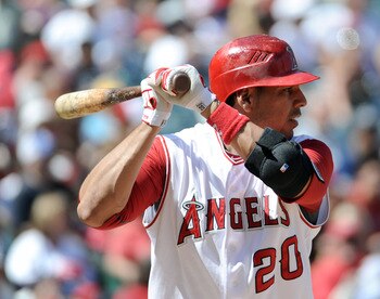 ANAHEIM, CA - SEPTEMBER 12:  Juan Rivera #20 of the Los Angeles Angels of Anaheim at bat against the Seattle Mariners during the game at Angel Stadium on September 12, 2010 in Anaheim, California.  (Photo by Harry How/Getty Images)