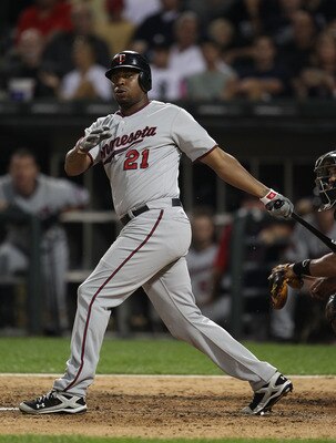 CHICAGO - AUGUST 10: Delmon Young #21 of the Minnesota Twins takes a swing against the Chicago White Sox at U.S. Cellular Field on August 10, 2010 in Chicago, Illinois. The Twins defeated the White Sox 12-6. (Photo by Jonathan Daniel/Getty Images)