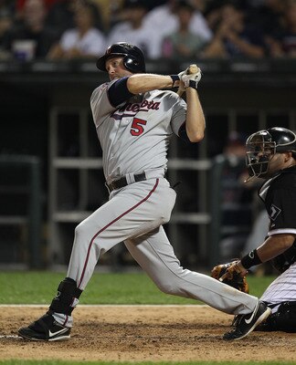 CHICAGO - AUGUST 10: Michael Cuddyer #5 of the Minnesota Twins takes a swing against the Chicago White Sox at U.S. Cellular Field on August 10, 2010 in Chicago, Illinois. The Twins defeated the White Sox 12-6. (Photo by Jonathan Daniel/Getty Images)