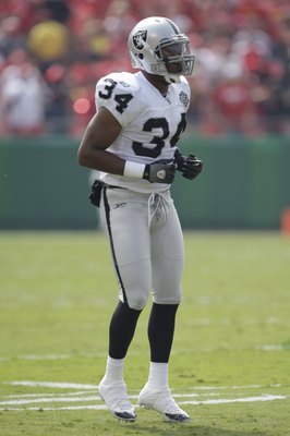KANSAS CITY, MO - SEPTEMBER 20:  Mike Mitchell #34 of the Oakland Raiders stands on the field during the game against the Kansas City Chiefs at Arrowhead Stadium on September 20, 2009 in Kansas City, Missouri. (Photo by Jamie Squire/Getty Images)