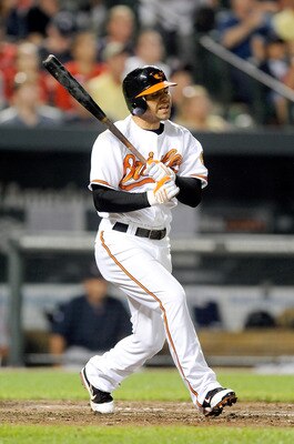 BALTIMORE - SEPTEMBER 02:  Brian Roberts #1 of the Baltimore Orioles reacts after flying out to end the seventh inning against the Boston Red Sox at Camden Yards on September 2, 2010 in Baltimore, Maryland.  (Photo by Greg Fiume/Getty Images)