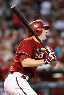 PHOENIX - SEPTEMBER 06:  Kelly Johnson #2 of the Arizona Diamondbacks hits a single against the San Francisco Giants during the Major League Baseball game at Chase Field on September 6, 2010 in Phoenix, Arizona.  (Photo by Christian Petersen/Getty Images)