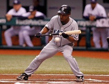 ST. PETERSBURG - SEPTEMBER 24:  Infielder Chone Figgins #9 of the Seattle Mariners attempts a bunt against the Tampa Bay Rays during the game at Tropicana Field on September 24, 2010 in St. Petersburg, Florida.  (Photo by J. Meric/Getty Images)
