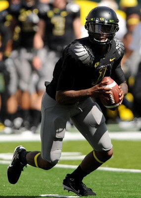 EUGENE, OR - SEPTEMBER 04:  Quarterback Darron Thomas #1 of the Oregon Ducks rolls out of the pocket in the second quarter of the game against the New Mexico Lobos at Autzen Stadium on September 4, 2010 in Eugene, Oregon. Oregon won the game 72-0. (Photo