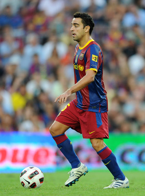 BARCELONA, SPAIN - SEPTEMBER 11:  Xavier Hernandez of Barcelona controls the ball during the La Liga match between Barcelona and Hercules at the Camp Nou stadium on September 11, 2010 in Barcelona, Spain. Barcelona lost the match 2-0.  (Photo by Jasper Ju