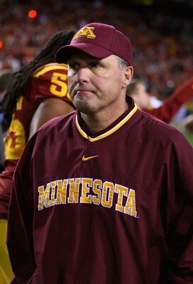 TEMPE, AZ - DECEMBER 31:  Head coach Tim Brewster of the Minnesota Golden Gophers walks off the field after being defeated by the Iowa State Cyclones in the Insight Bowl at Arizona Stadium on December 31, 2009 in Tempe, Arizona. The Cyclones defeated the 