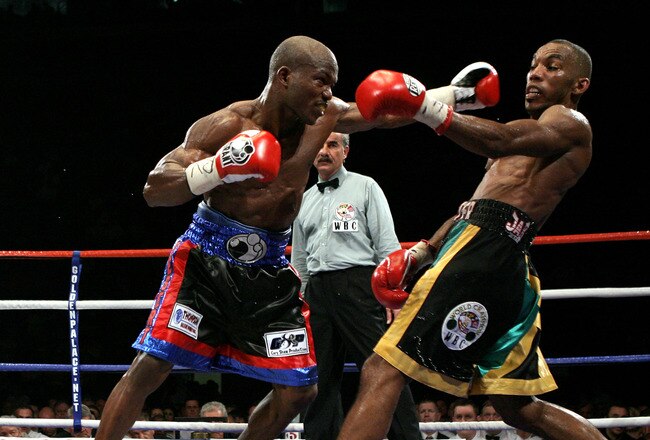 NOTTINGHAM, ENGLAND - MAY 10:  Timothy Bradley (L) misses with a left hook in his fight against Junior Witter during their WBC Light Welterweight fight on May 10, 2008 at Nottingham Ice Arena in Nottingham, England. (Photo by John Gichigi/Getty Images)