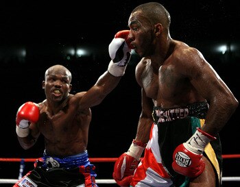 NOTTINGHAM, ENGLAND - MAY 10:  Timothy Bradley connects with a left jab on Junior Witter down during their WBC Light Welterweight fight on May 10, 2008 at Nottingham Ice Arena in Nottingham, England. (Photo by John Gichigi/Getty Images)