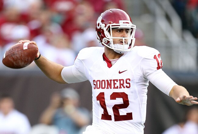 CINCINNATI - SEPTEMBER 25:  Landry Jones #12 of the Oklahoma Sooners throws a pass during the game against the Cincinnati Bearcats at Paul Brown Stadium on September 25, 2010 in Cincinnati, Ohio.  (Photo by Andy Lyons/Getty Images)