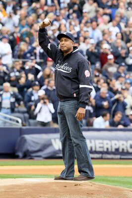 NEW YORK - APRIL 13:  Bernie Williams, former player for the New York Yankees, acknowledges the fans as he gets set to throw out the ceremonial first pitch against the Los Angeles Angels of Anaheim during the Yankees home opener at Yankee Stadium on April