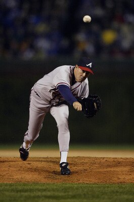 CHICAGO - OCTOBER 3:  Greg Maddux #31 of the Atlanta Braves throws against the Chicago Cubs during game three of the National League Division Series on October 3, 2003 at Wrigley Field in Chicago, Illinois.  The Cubs defeated the Braves 3-1.  (Photo by Ma