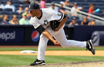 NEW YORK - AUGUST 04:  Mariano Rivera #42 of the New York Yankees delivers a pitch against the Toronto Blue Jays on August 4, 2010 at Yankee Stadium in the Bronx borough of New York City.  (Photo by Jim McIsaac/Getty Images)