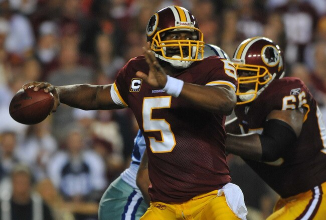 LANDOVER - SEPTEMBER 12:  Donovan McNabb #5 of the Washington Redskins passes during the NFL season opener against the Dallas Cowboys at FedExField on September 12, 2010 in Landover, Maryland. The Redskins defeated the Cowboys 13-7. (Photo by Larry French