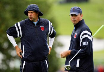 NEWPORT, WALES - SEPTEMBER 29:  Stewart Cink, (L) and Matt Kuchar of the USA wait on a green during a practice round prior to the 2010 Ryder Cup at the Celtic Manor Resort on September 29, 2010 in Newport, Wales.  (Photo by Sam Greenwood/Getty Images)
