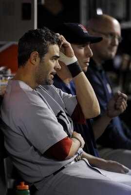 ANAHEIM, CA - OCTOBER 09:  Mike Lowell #25 of the Boston Red Sox watches the game from the dugout during the ALDS in the 2009 MLB Playoffs against the Los Angeles Angels of Anaheim at Angel Stadium on October 9, 2009 in Anaheim, California. (Photo by Kevo