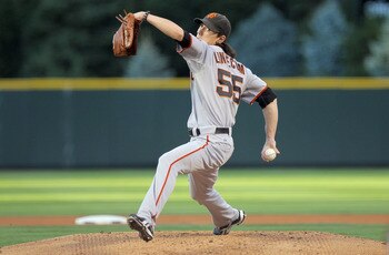 DENVER - SEPTEMBER 24:  Starting pitcher Tim Lincecum #55 of the San Francisco Giants delivers against the Colorado Rockies at Coors Field on September 24, 2010 in Denver, Colorado. Lincecum earned the win as the Giants defeated the Rockies 2-1.  (Photo b