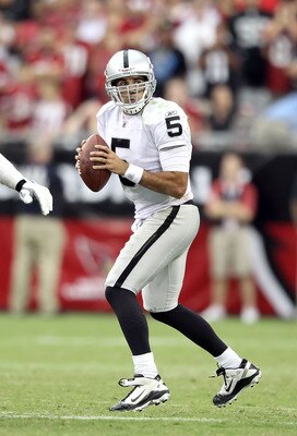 GLENDALE, AZ - SEPTEMBER 26:  Quarterback Bruce Gradkowski #5 of the Oakland Raiders drops back to pass during the NFL game against the Arizona Cardinals at the University of Phoenix Stadium on September 26, 2010 in Glendale, Arizona.  The Cardinals defea