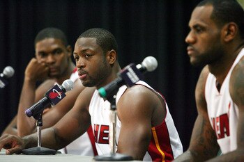 MIAMI - SEPTEMBER 27:  (L-R) Chris Bosh, Dwyane Wade and LeBron James of the Miami Heat answers questions during media day at the Bank United Center on September 27, 2010 in Miami, Florida. NOTE TO USER: User expressly acknowledges and agrees that, by dow