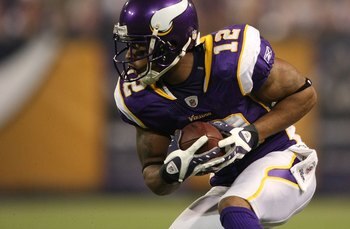 MINNEAPOLIS - NOVEMBER 22:  Percy Harvin #12 of the Minnesota Vikings runs the ball against the Seattle Seahawks at Hubert H. Humphrey Metrodome on November 22, 2009 in Minneapolis, Minnesota.  (Photo by Nick Laham/Getty Images)