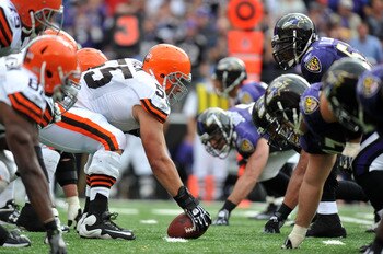 BALTIMORE - SEPTEMBER 26:  Alex Mack #55 of the Cleveland Browns snaps the ball against the Baltimore Ravens  at M&T Bank Stadium on September 26, 2010 in Baltimore, Maryland. The Ravens defeated the Browns 24-17. (Photo by Larry French/Getty Images)