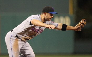 PHILADELPHIA - SEPTEMBER 25: Third baseman David Wright #5 of the New York Mets fields a ground ball during a game against the Philadelphia Phillies at Citizens Bank Park on September 25, 2010 in Philadelphia, Pennsylvania. The Mets won 5-2. (Photo by Hun