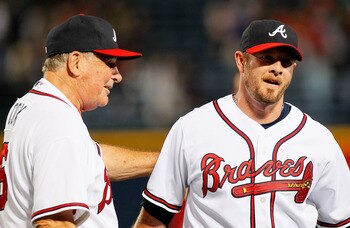 ATLANTA - JUNE 25:  Manager Bobby Cox #6 congratulates closer Billy Wagner #13 of the Atlanta Braves after his 400th career save with a 3-1 win against the Detroit Tigers at Turner Field on June 25, 2010 in Atlanta, Georgia.  (Photo by Kevin C. Cox/Getty