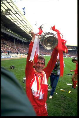 MAY 1986:  KENNY DALGLISH OF LIVERPOOL CELEBRATES WITH THE FA CUP AFTER LIVERPOOL HAD BEATEN EVERTON 3-1 IN THE FINAL AT WEMBLEY.