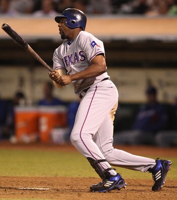 OAKLAND, CA - SEPTEMBER 24:  Vladimir Guerrero #27 of the Texas Rangers hits a three run double in the seventh inning against the Oakland Athletics during a Major League Baseball game at the Oakland-Alameda County Coliseum on September 24, 2010 in Oakland