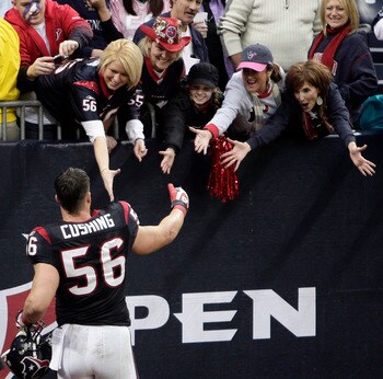 HOUSTON - JANUARY 03:  Linebacker Brian Cushing #56 shakes hands with the fans after their win over the New England Patriots at Reliant Stadium on January 3, 2010 in Houston, Texas.  (Photo by Bob Levey/Getty Images)