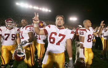 SOUTH BEND, IN - OCTOBER 15:  Center Ryan Kalil #67 of the University of Southern California Trojans gives the 'V' for victory during the game against the University of Notre Dame Fighting Irish on October 15, 2005 at Notre Dame Stadium in South Bend, Ind