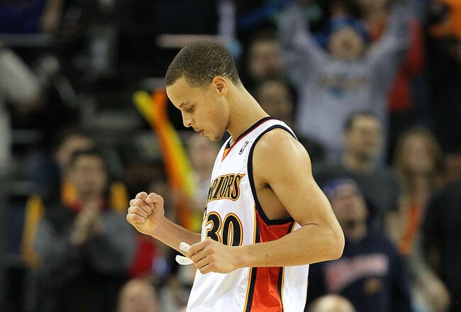 OAKLAND, CA - FEBRUARY 21:  Stephen Curry #30 of the Golden State Warriors celebrates against the Atlanta Hawks during an NBA game at Oracle Arena on February 21, 2010 in Oakland, California.  NOTE TO USER: User expressly acknowledges and agrees that, by