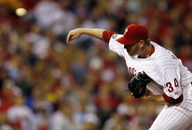 PHILADELPHIA - OCTOBER 06:  Roy Halladay #34 of the Philadelphia Phillies delivers in Game 1 of the NLDS against the Cincinnati Reds at Citizens Bank Park on October 6, 2010 in Philadelphia, Pennsylvania. Halladay threw the first postseason no-hitter sinc