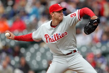 DENVER - MAY 12:  Starting pitcher Roy Halladay #34 of the Philadelphia Phillies delivers against the Colorado Rockies at Coors Field on May 12, 2010 in Denver, Colorado. The Rockies defeated the Phillies 4-3 in 10 innings.  (Photo by Doug Pensinger/Getty
