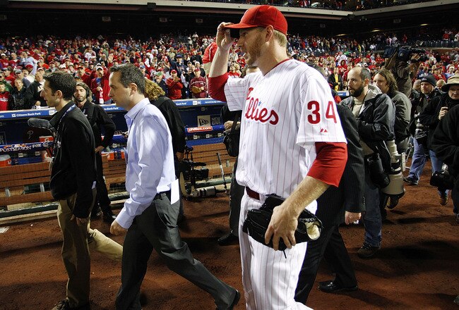 PHILADELPHIA - OCTOBER 06:  Roy Halladay #34 of the Philadelphia Phillies walks to the dugout after pitching a no-hitter in Game 1 of the NLDS against the Cincinnati Reds at Citizens Bank Park on October 6, 2010 in Philadelphia, Pennsylvania.  (Photo by J