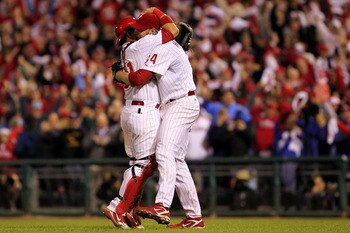 PHILADELPHIA - OCTOBER 06:  Roy Halladay #34 and Carlos Ruiz #51 of the Philadelphia Phillies celebrate Halladay's no-hitter and the win in Game 1 of the NLDS against the Cincinnati Reds at Citizens Bank Park on October 6, 2010 in Philadelphia, Pennsylvan