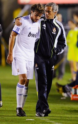 PASADENA, CA - AUGUST 07: Pedro Leon of Real Madrid with coach Jose Mourinho  during their pre-season friendly soccer match against Los Angeles Galaxy on August 7, 2010 at the Rose Bowl in Pasadena, California. Real Madrid will travel back to Spain after 