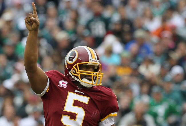 PHILADELPHIA - OCTOBER 03:  Donovan McNabb #5 of the Washington Redskins celebrates after throwing a first quater touchdown pass against the Philadelphia Eagles on October 3, 2010 at Lincoln Financial Field in Philadelphia, Pennsylvania.  (Photo by Jim Mc