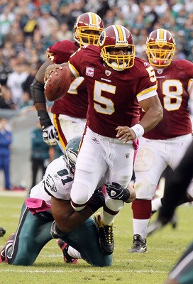 PHILADELPHIA - OCTOBER 03:  Donovan McNabb #5 of the Washington Redskins runs the ball against Darryl Tapp #91 of the Philadelphia Eagles  on October 3, 2010 at Lincoln Financial Field in Philadelphia, Pennsylvania.  (Photo by Jim McIsaac/Getty Images)