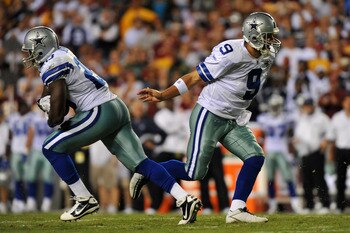 LANDOVER - SEPTEMBER 12:  Tony Romo #9 of the Dallas Cowboys hands off to Felix Jones #28 during the NFL season opener against the Washington Redskins at FedExField on September 12, 2010 in Landover, Maryland. The Redskins defeated the Cowboys 13-7. (Phot