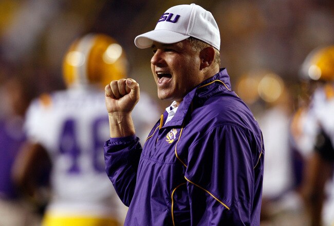BATON ROUGE, LA - SEPTEMBER 25:  Head coach Les Miles of the Louisiana State University Tigers cheers during pregame before playing the West Virginia Mountaineers at Tiger Stadium on September 25, 2010 in Baton Rouge, Louisiana.  The Tigers defeated the M